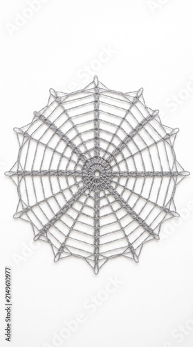 Handmade Grey Crocheted Spiderweb Decoration for a Spooky Halloween Seasonal Campaign