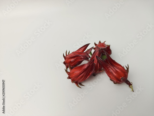 Fresh red roselle calyces group isolated on white background