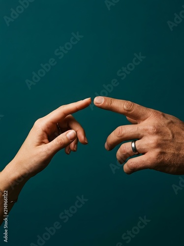Man's and woman's hands reaching toward each other, connection concept