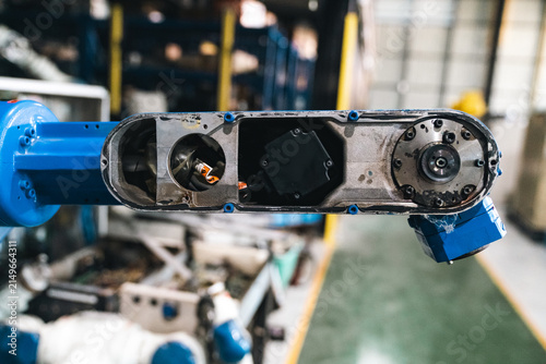 Картината върху платно Industrial robot arm mechanical joint automation factory machinery metal blue eq