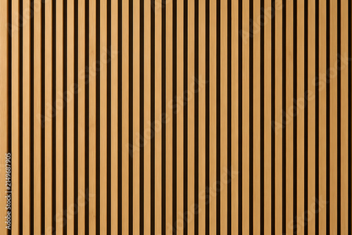 Natural vertical wood slat wall texture background, decorative timber batten paneling for modern interior design and architectural visualization