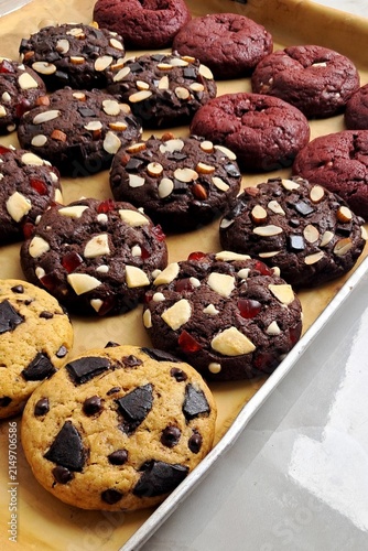 Freshly baked cookies with a golden-brown finish and chocolate chips. Perfectly crisp on the edges with a soft center, offering a delicious, comforting treat for any occasion.
