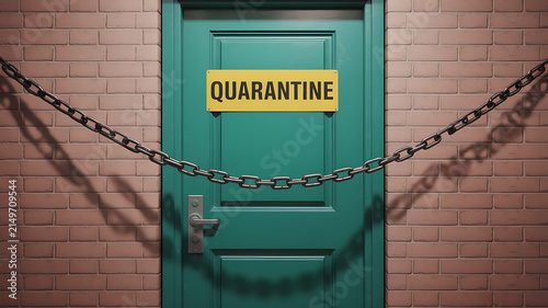 A green door with a yellow quarantine sign is blocked by a heavy metal chain.