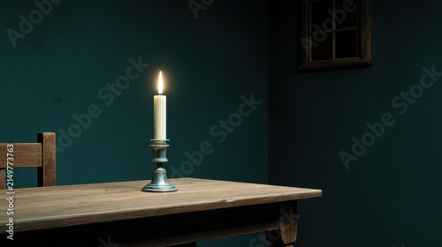 Candle illuminating old room with subtle light