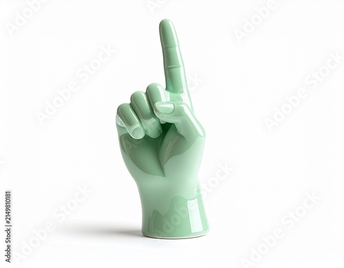Light green hand figurine with index finger pointing up, isolated on white background, decorative design element