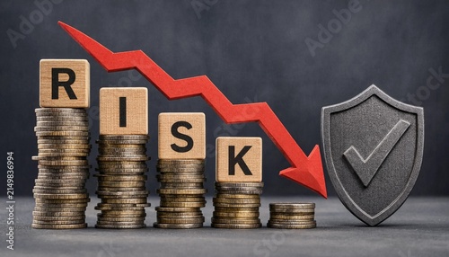 Financial security concept showing decreasing risk with protective shield and stacks of coins