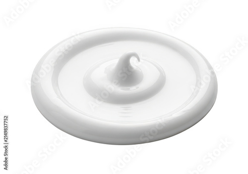 A smooth swirl of white cosmetic cream or lotion