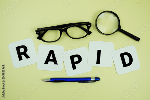 Принти на полотні RAPID alphabet letters with magnifying glass, eye glasses and pen on yellow back