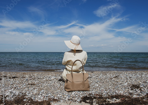 woman sitting on the Baltic beach