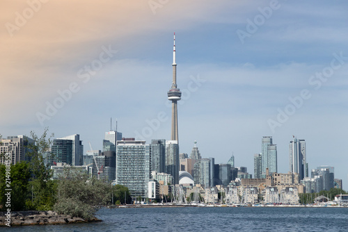 Photography City skyline with a tower rising above the waterfront