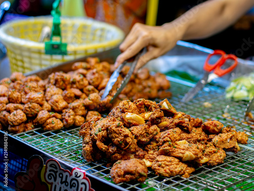 Photography Freshly Fried Thai Fish Cakes Tod Mun Being Picked with Tongs at Market Food Sta