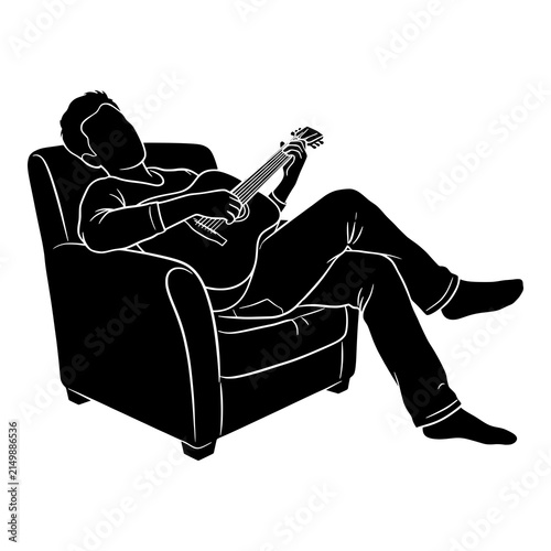 Man playing acoustic guitar sitting in cozy armchair black vector icon.