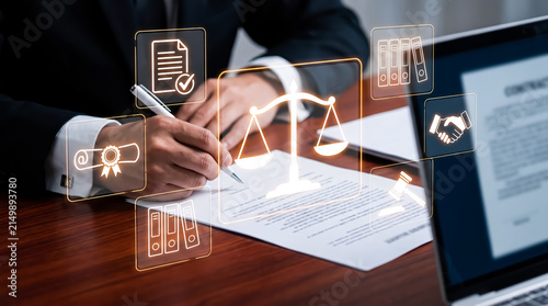 Close up of a lawyer signing a legal contract with digital law icons overlay, legal and law concept, legal advice and services