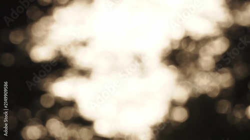 Abstract background blinking gold rounds and particles