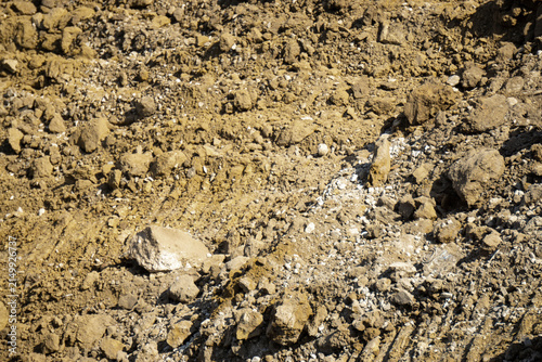 Close-Up of Dry Earth Rubble and Broken Rocks Pile After Construction Demolition