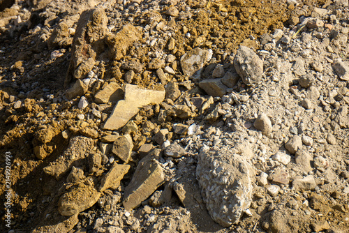 Close-Up of Dry Earth Rubble and Broken Rocks Pile After Construction Demolition
