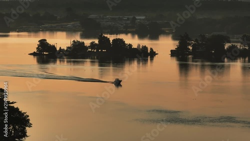 Aerial view of a boat on the St. Lawrence River at sunset