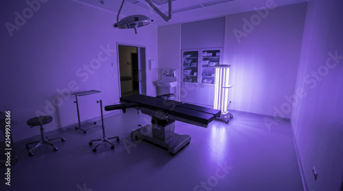 Empty Operating Room with Surgical Table and UV Sterilization Light in Hospital
