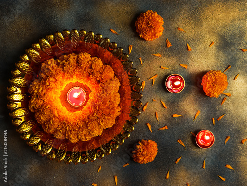 Happy Diwali, Indian festival of lights decorated with marigolds and candles.