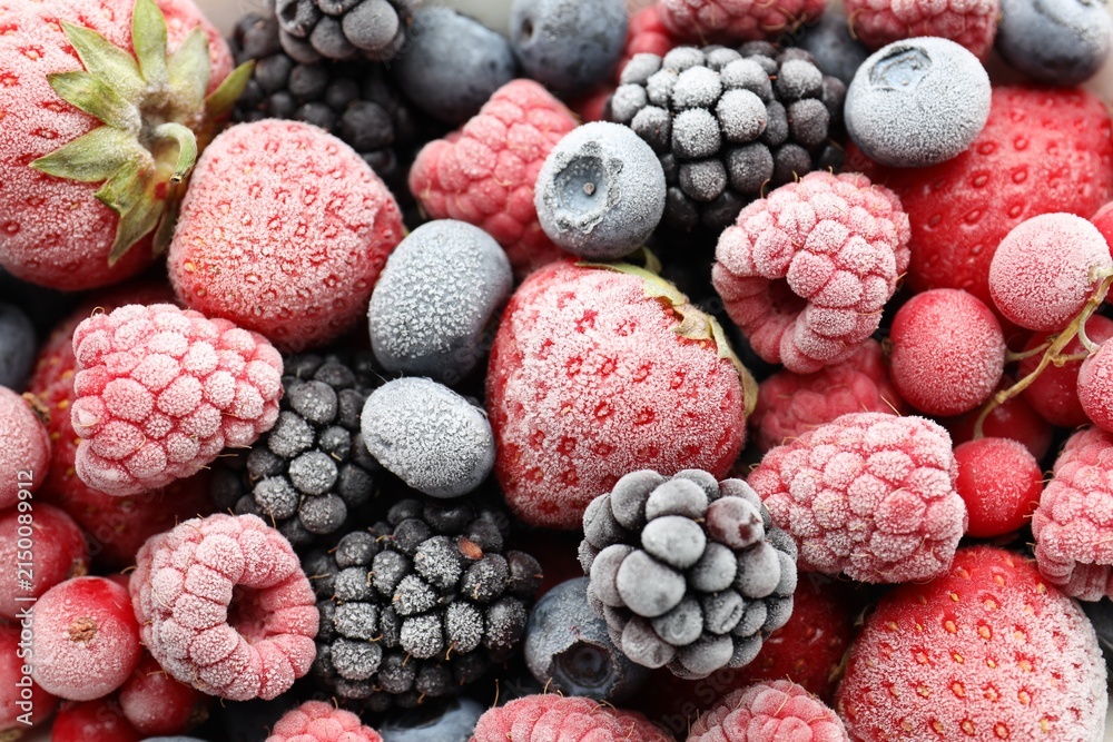Fototapeta premium Different frozen berries as background, top view