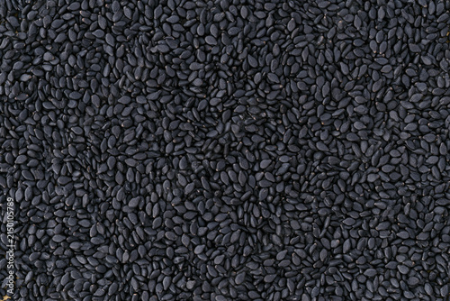 Obraz na płótnie Raw Organic Black Sesame Seeds Surface Texture Background Close Up