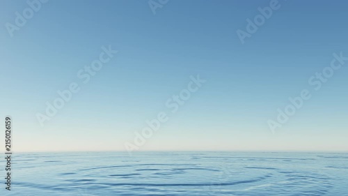 Water droplet falling on water surface forming a beautiful water splash crown