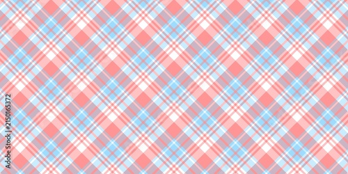 Red and blue argyle plaid pattern background. Coral pink and light blue diagonal tartan check lines for textiles and wallpaper.