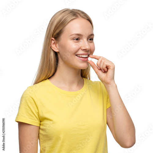 Woman taking a small white pill isolated on transparent background
