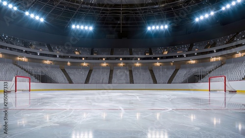 Ice hockey rink interior with two red goal nets, bright arena lights illuminating the smooth ice surface and empty spectator stands in a modern sports facility