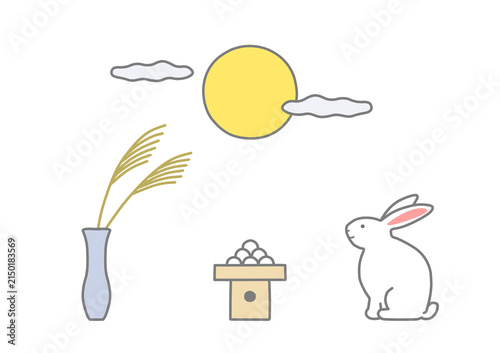 月見団子とススキを飾りお月見をするウサギのイラスト