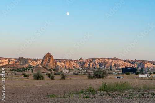 Photography Beautiful view of the city of Cavusin in the evening, amazing views of Cappadocia
