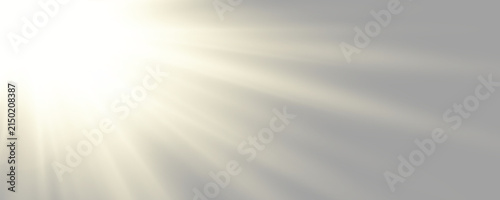 Obraz na plátne Golden light rays spreading from a brilliant center