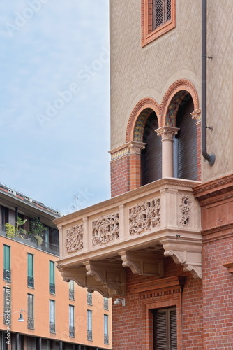 facade of an old building with windows and balconies in milano italy 