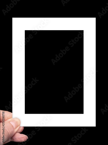 An empty photo frame handheld for photography with copyspace