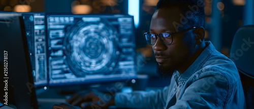 Analyst Working with Futuristic Cybersecurity Data Interface