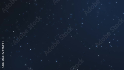 Sparkling blue dust particles floating slowly in dark atmosphere creating seamless motion background animation for projects