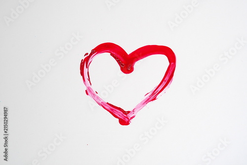 Red watercolor hand painted heart on white paper background