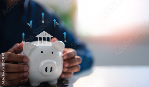 Piggy bank saving bank for account save money percentage. Planning step up, saving money for future plan, retirement fund. Business investment-finance accounting, Percentage performance concept.