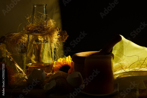 Fotografía Rustic still life with sunflower, mortar and pestle