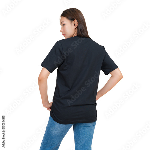 Woman wearing a black t-shirt and blue jeans, viewed from the back