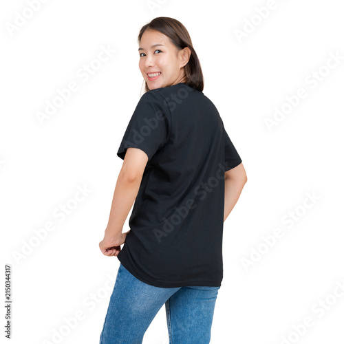 Young woman in black t-shirt and blue jeans posing for a product shot