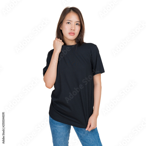 Young woman wearing a plain black t-shirt and blue jeans, isolated on white background