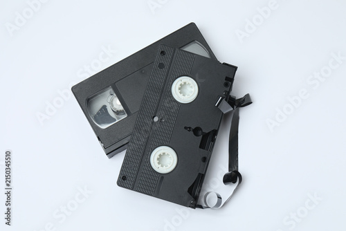 Bild auf Leinwand A video cassette against a colored background