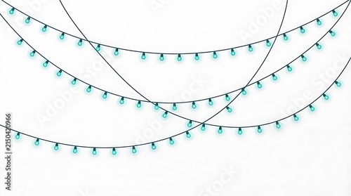 Delicate strands of teal string lights hanging against a white background creating a festive and celebratory atmosphere for holidays
