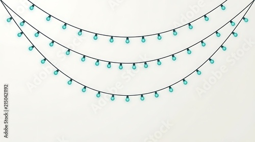 Multiple strands of teal string lights hanging against a plain white background creating a festive atmosphere
