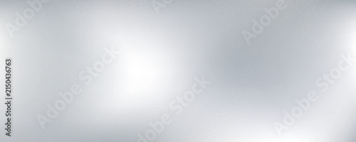 фотографія Silver foil background with metal mirror texture