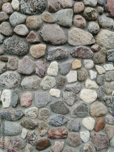 Fotografie Natural cobblestone wall texture background