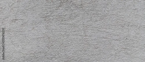 Panel kuchenny z motywem Textured grey concrete wall background, industrial cement surface with grainy detail, minimalist stone plaster texture for architectural design