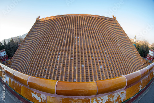 Yellow glazed tiles of Xiangyan Zongyin Pavilion in the Summer Palace of Beijing