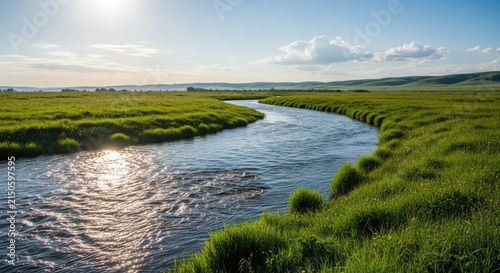 Winding River Through Lush Green Meadow At Sunset